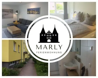 Ein Bett oder Betten in einem Zimmer der Unterkunft Ferienwohnung Marly