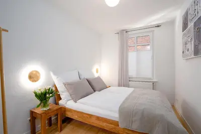 Ein Bett oder Betten in einem Zimmer der Unterkunft AMW18 Ferienwohnung Alte Liebe