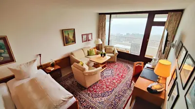 Ein Bett oder Betten in einem Zimmer der Unterkunft Gemütliche Ferienresidenz mit Meerblick über die wundervolle Lübecker Bucht