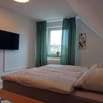 Ein Bett oder Betten in einem Zimmer der Unterkunft Ferienhaus mit 4 Schlafzimmer