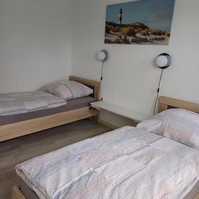 Ein Bett oder Betten in einem Zimmer der Unterkunft Ferienhaus mit 4 Schlafzimmer