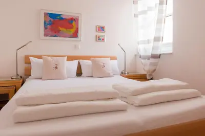 Ein Bett oder Betten in einem Zimmer der Unterkunft Seehaus zur Strandbrücke