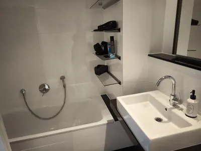 Ein Badezimmer in der Unterkunft Familienzeit, moderne Ferienwohnung mit Sauna in Timmendorfer Strand