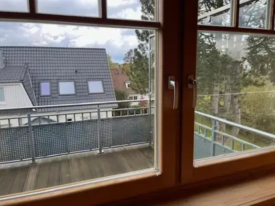 Ein Balkon oder eine Terrasse in der Unterkunft Familienzeit, moderne Ferienwohnung mit Sauna in Timmendorfer Strand