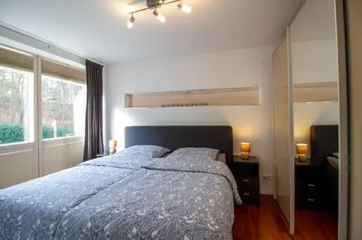 Ein Bett oder Betten in einem Zimmer der Unterkunft Ocean Club