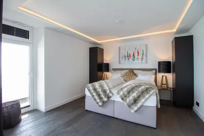 Ein Bett oder Betten in einem Zimmer der Unterkunft Baltic View 360