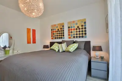 Ein Bett oder Betten in einem Zimmer der Unterkunft Ocean Breeze No 6