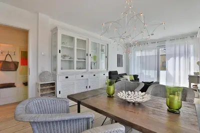 Ein Sitzbereich in der Unterkunft Ocean Breeze No 6