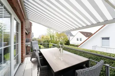 Ein Balkon oder eine Terrasse in der Unterkunft Neue Bergstraße 12 Scharbeutzflair