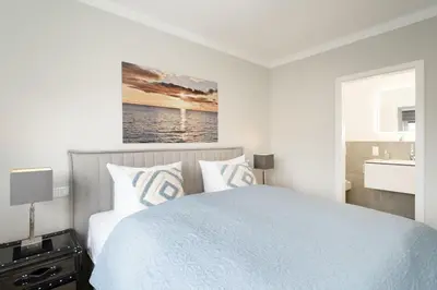 Ein Bett oder Betten in einem Zimmer der Unterkunft Neue Bergstraße 12 Scharbeutzflair
