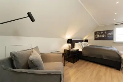 Ein Sitzbereich in der Unterkunft Neue Bergstraße 12 Scharbeutzflair