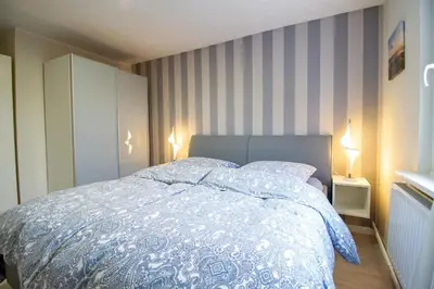 Ein Bett oder Betten in einem Zimmer der Unterkunft Nautic Lounge - Beach House 1