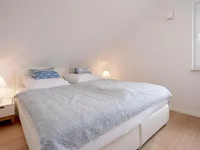 Ein Bett oder Betten in einem Zimmer der Unterkunft Drie Zeeparels & Spa