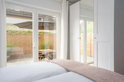 Ein Bett oder Betten in einem Zimmer der Unterkunft KAS13b Ferienwohnung Merlina´s Home