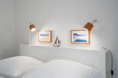 Ein Bett oder Betten in einem Zimmer der Unterkunft KAS13b Ferienwohnung Merlina´s Home