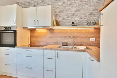 Küche/Küchenzeile in der Unterkunft Strandglück Haus C Strandglück Appartement 10C
