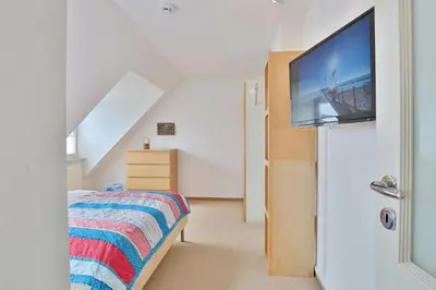 Ein Bett oder Betten in einem Zimmer der Unterkunft Hansa Residenz II Hansa-Residenz II Appartement 31