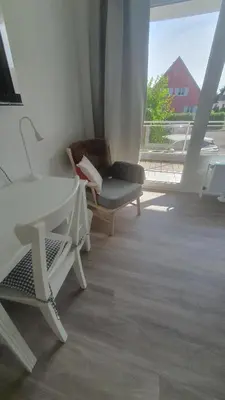 Ein Sitzbereich in der Unterkunft FeWo Machedanz strandnah Timmendorf Strand