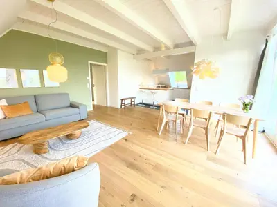Ein Sitzbereich in der Unterkunft Timmenhus - Ferienwohnungen an der Ostsee