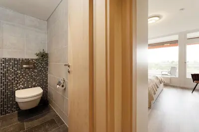 Ein Badezimmer in der Unterkunft An der Waldkapelle 26 Waterfront 11