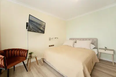 Ein Bett oder Betten in einem Zimmer der Unterkunft An der Waldkapelle 26 Waterfront 11