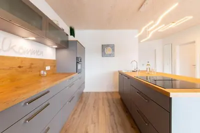 Küche/Küchenzeile in der Unterkunft Ferienhaus Eastside - Niendorf