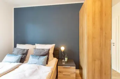 Ein Bett oder Betten in einem Zimmer der Unterkunft Ferienhaus Westside Niendorf