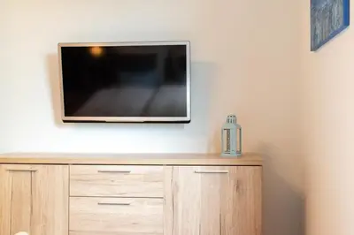TV/Unterhaltungsangebot in der Unterkunft Ferienhaus Westside Niendorf