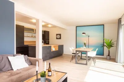 Ein Sitzbereich in der Unterkunft Ferienhaus Westside Niendorf