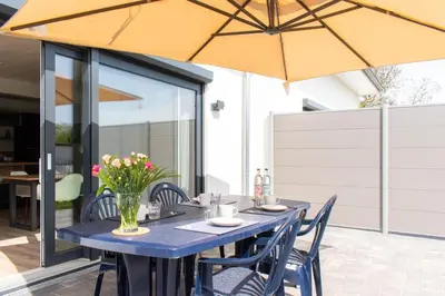Ein Balkon oder eine Terrasse in der Unterkunft Ferienhaus Westside Niendorf