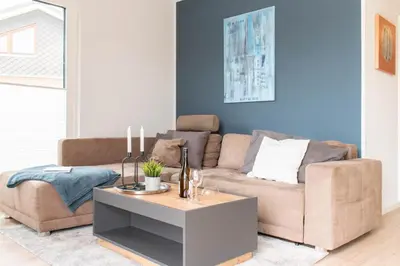 Ein Sitzbereich in der Unterkunft Ferienhaus Westside Niendorf