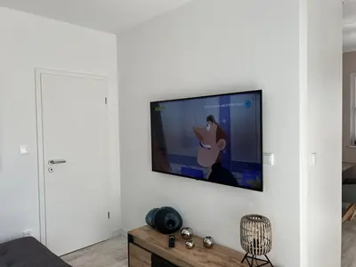 TV/Unterhaltungsangebot in der Unterkunft Beach House Comfortable holiday residence