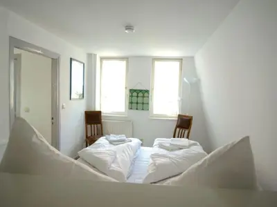 Ein Bett oder Betten in einem Zimmer der Unterkunft On the Trave Comfortable holiday residence
