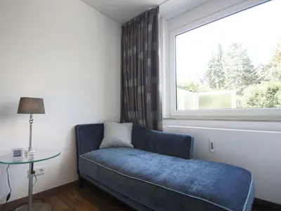 Ein Bett oder Betten in einem Zimmer der Unterkunft At the pier I Comfortable Vacation Home