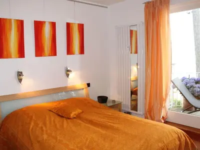 Ein Bett oder Betten in einem Zimmer der Unterkunft On the Beach II Comfortable holiday residence