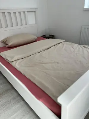 Ein Bett oder Betten in einem Zimmer der Unterkunft Katzensprung zum Holstentor!