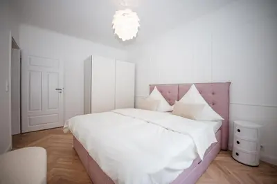 Ein Bett oder Betten in einem Zimmer der Unterkunft Hanse Villa 