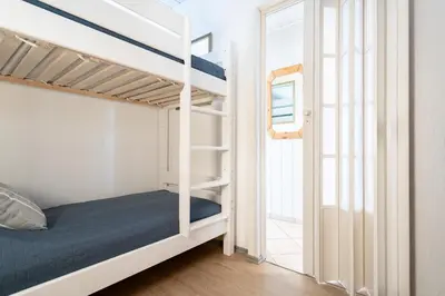 Ein Bett oder Betten in einem Zimmer der Unterkunft Ferienpark Sierksdorf App 348