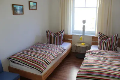 Ein Bett oder Betten in einem Zimmer der Unterkunft Haus Schwalbennest