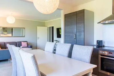 Ein Sitzbereich in der Unterkunft Ferienwohnung Küstenschatz - Timmendorfer Strand