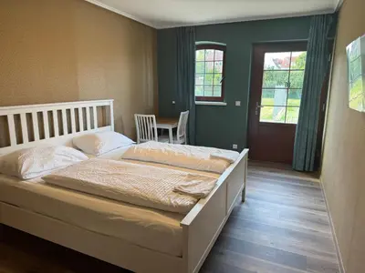 Ein Bett oder Betten in einem Zimmer der Unterkunft PENSION AMEDY