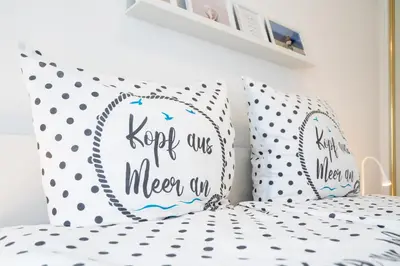 Ein Bett oder Betten in einem Zimmer der Unterkunft Carpe Diem App 115