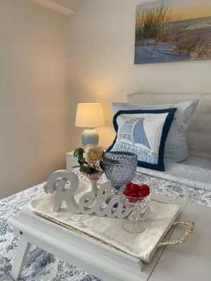 Ein Bett oder Betten in einem Zimmer der Unterkunft Ferienwohnung Strandoase inklusive Terrasse und Parkplatz - Sonnenseite