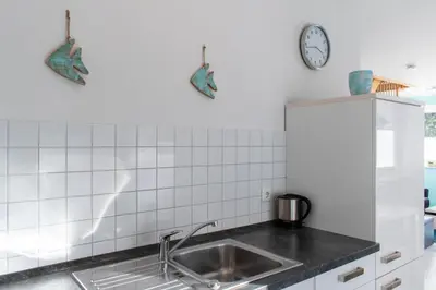Küche/Küchenzeile in der Unterkunft Ferienwohnung Moderne Brise Scharbeutz