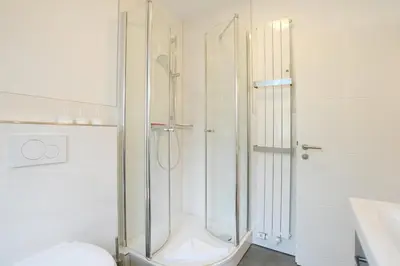 Ein Badezimmer in der Unterkunft Am Rosenhain 14 Appartement 4