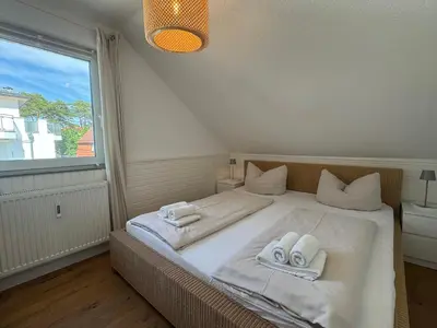 Ein Bett oder Betten in einem Zimmer der Unterkunft Ocean Escape - Teil der HolidayEscapes Kollektion