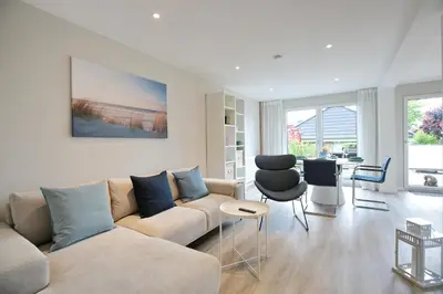 Ein Sitzbereich in der Unterkunft Lindenallee 4 Appartement Meerverliebt