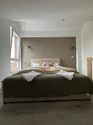 Ein Bett oder Betten in einem Zimmer der Unterkunft Luxus-Oase zwischen Ostsee und Lübeck