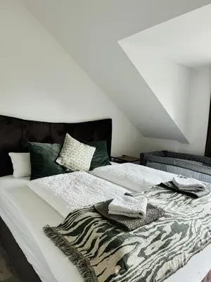 Ein Bett oder Betten in einem Zimmer der Unterkunft Luxus-Oase zwischen Ostsee und Lübeck