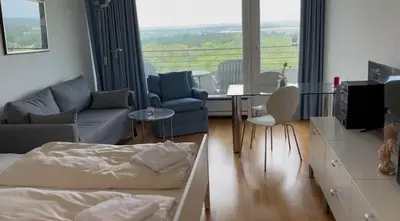 Ein Sitzbereich in der Unterkunft Apartment Himmlischer Ausblick